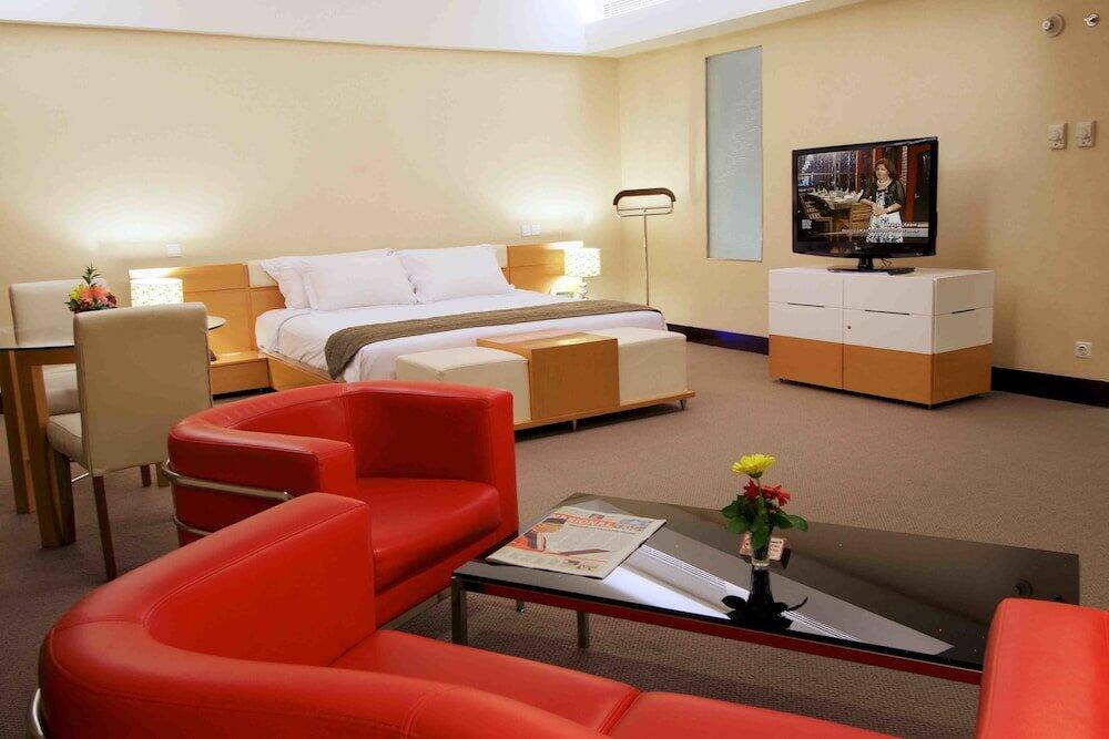 Foto de una habitación de Merlynn Park Hotel
