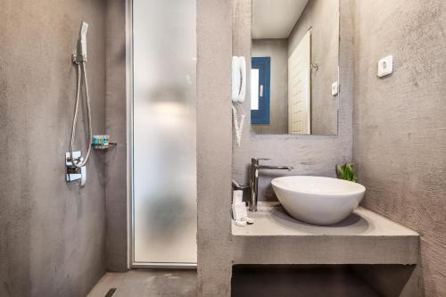 Foto del baño de Atrium Hotel