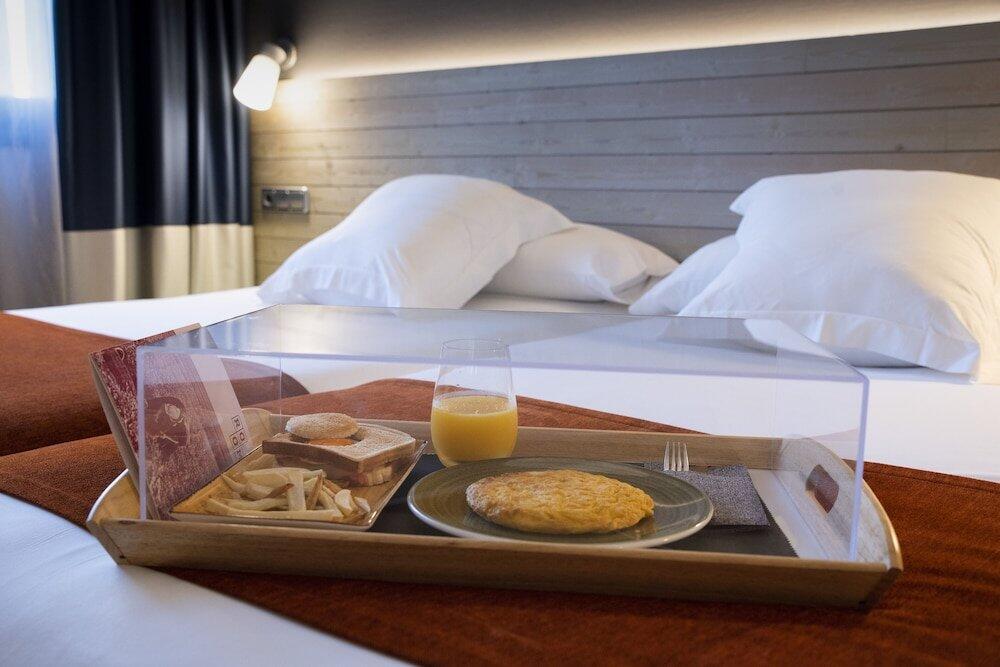 Foto de una habitación de Hotel Avenida