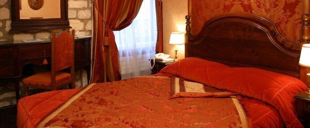 Foto de una habitación de Grand Hôtel Dechampaigne