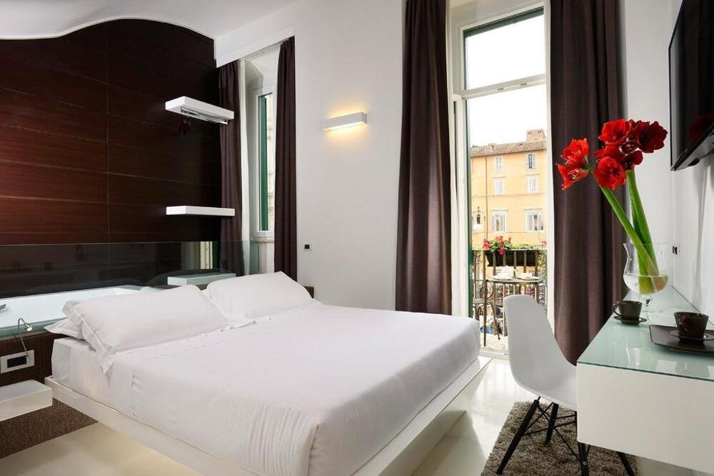 Foto de una habitación de Hotel Navona Stay