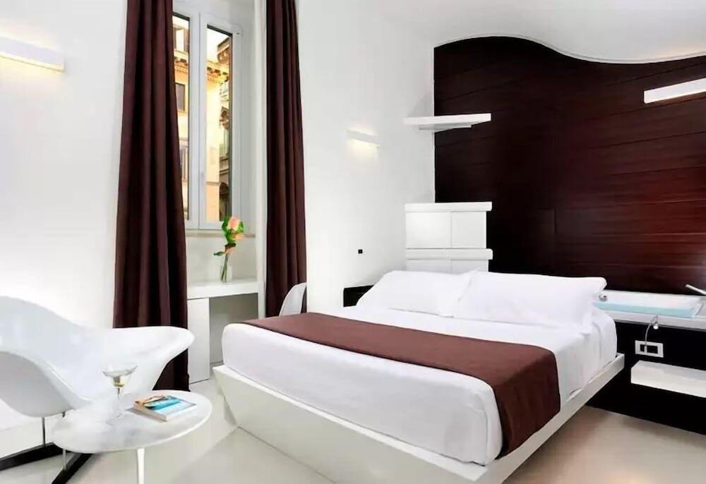 Foto de una habitación de Hotel Navona Stay