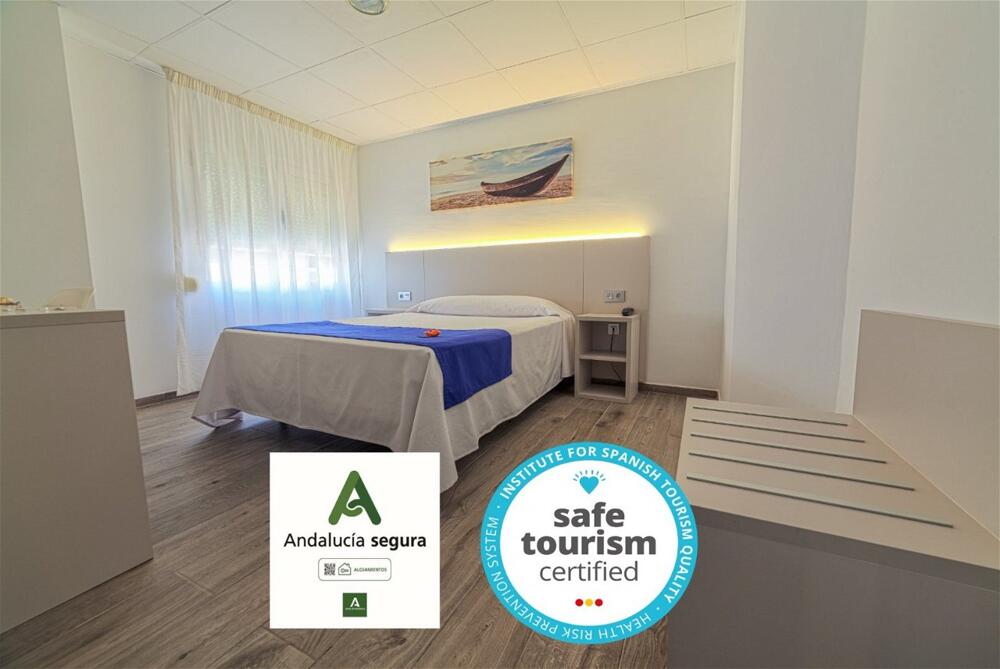 Foto de una habitación de Hotel La Perla