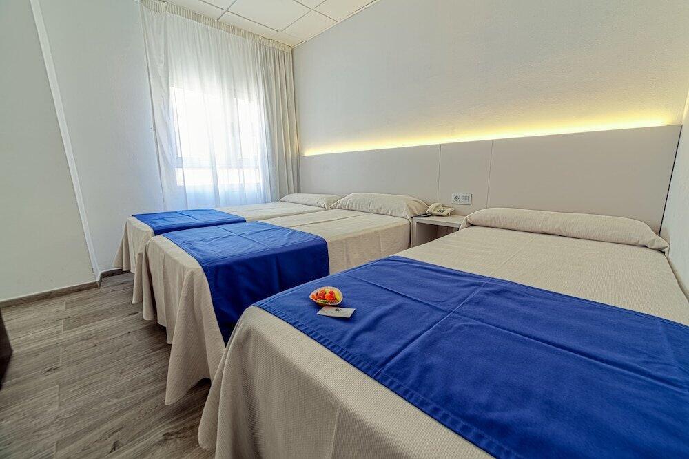 Foto de una habitación de Hotel La Perla