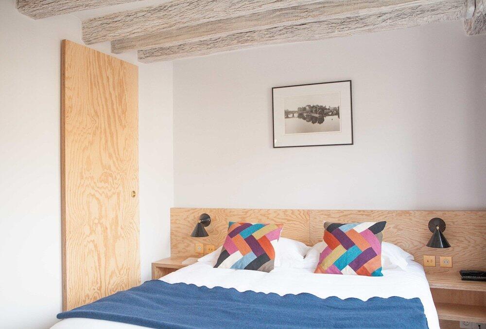 Foto de una habitación de Hôtel Montholon