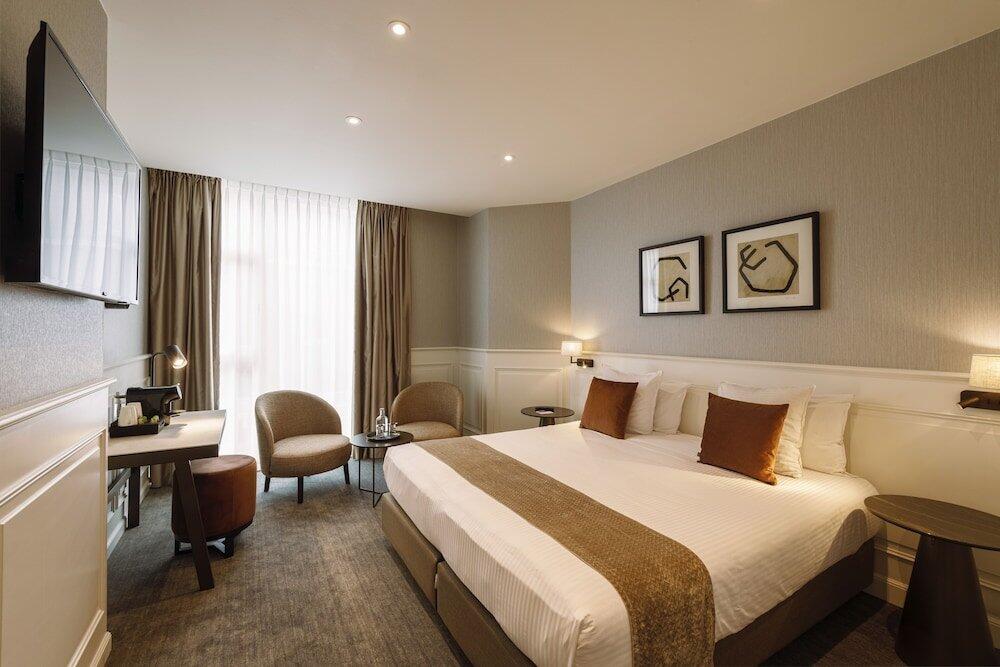 Foto de una habitación de Hotel Academie