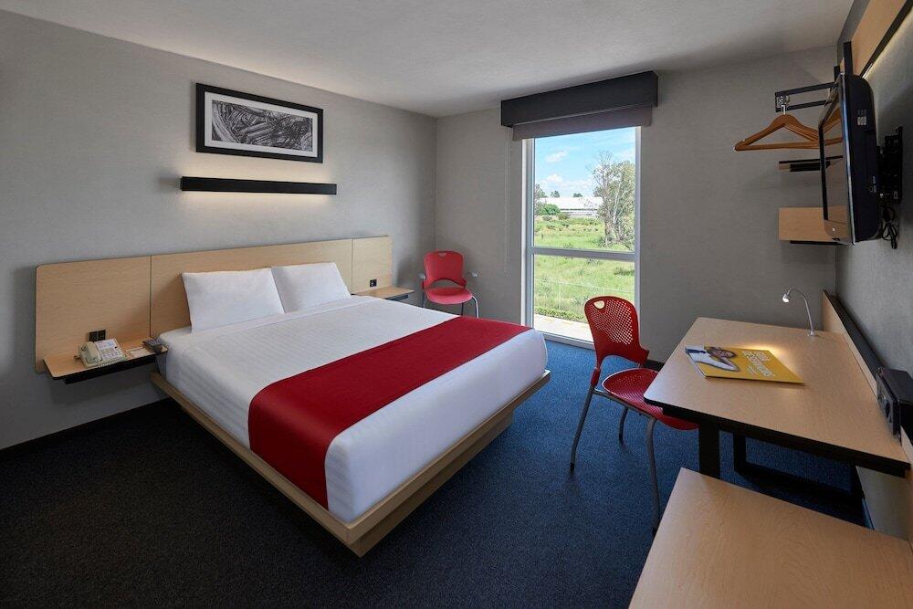 Foto de una habitación de Hotel City Express Tehuacan
