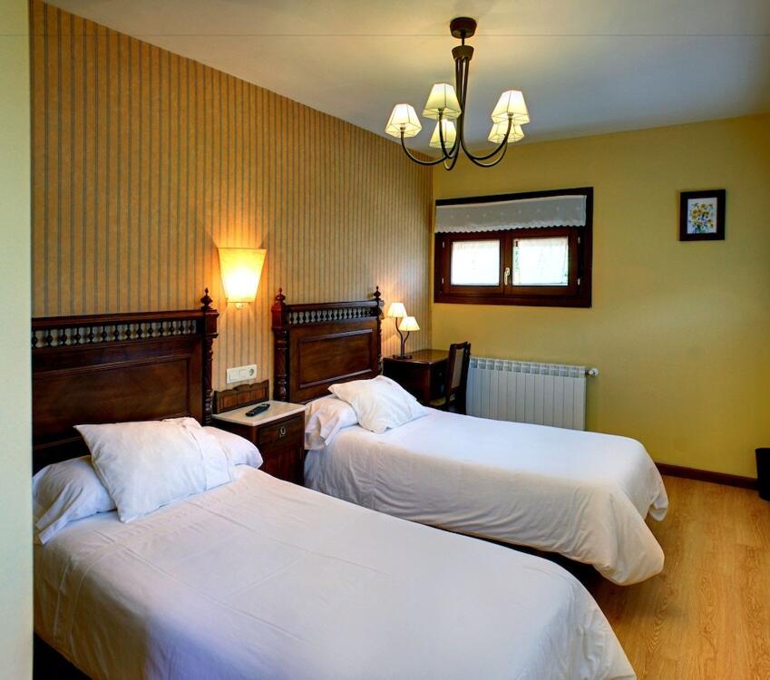 Foto de una habitación de Coviella Hotel Rural