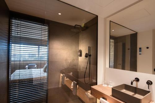 Foto del baño de BAH Barcelona Airport Hotel