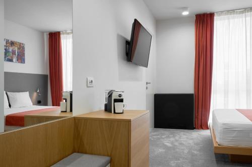 Foto de una habitación de Adella Boutique Hotel - Free Parking