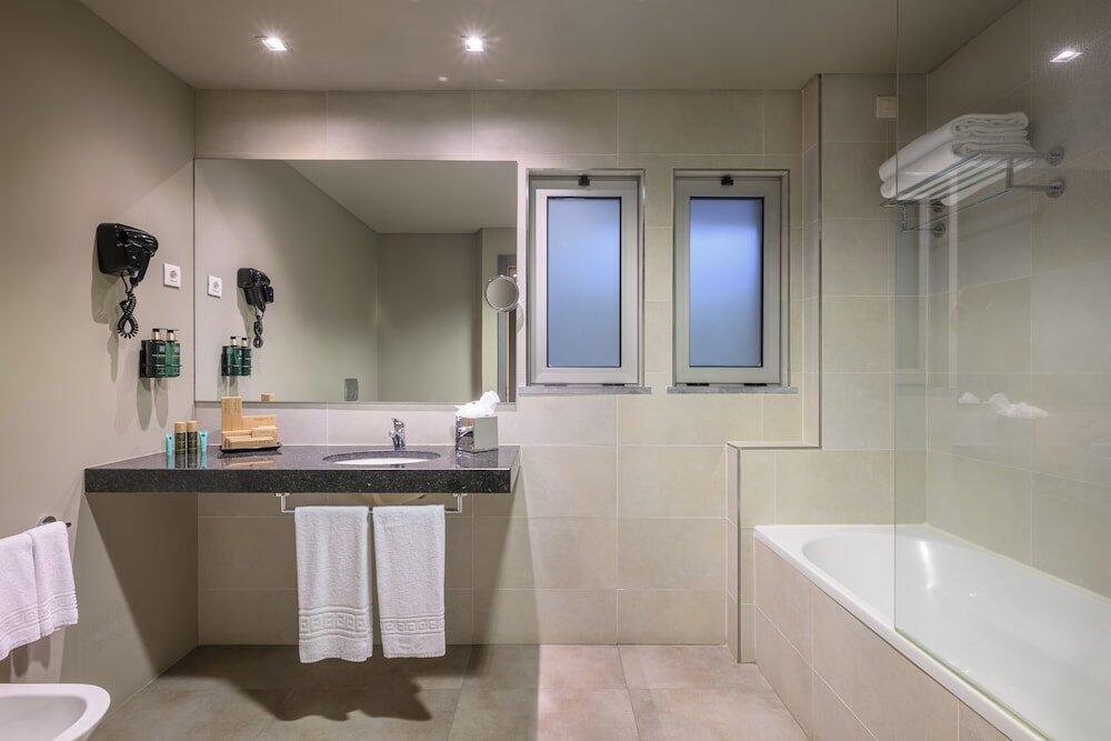 Foto del baño de Hotel Melia Setubal