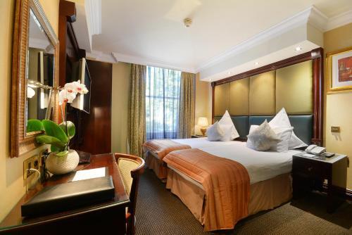Foto de una habitación de Hotel The Premier Notting Hill