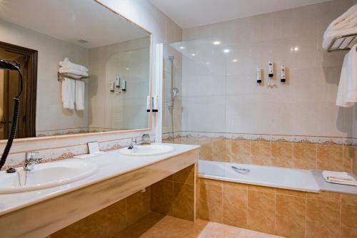 Foto del baño de Hotel La Cepada