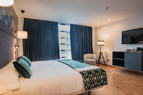 Foto de una habitación de Hotel La Cepada