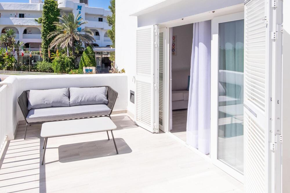 Foto de una habitación de Hotel Club Es Talaial