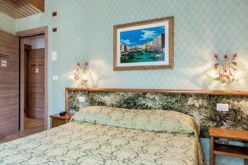 Foto de una habitación de Hotel Venezia