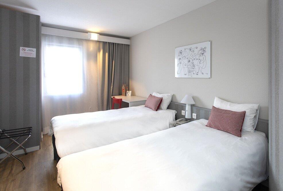 Foto de una habitación de Hotel ibis Valencia Alfafar