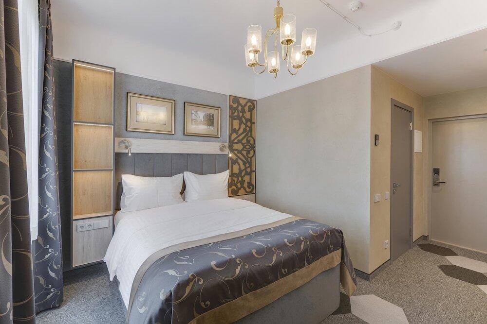 Foto de una habitación de Metropole Hotel by Semarah