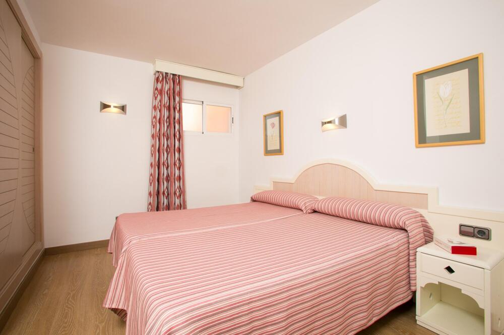 Foto de una habitación de Aparthotel Aquasol