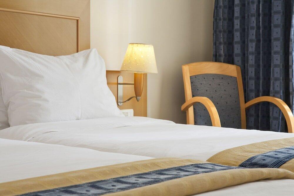 Foto de una habitación de Plaka Hotel
