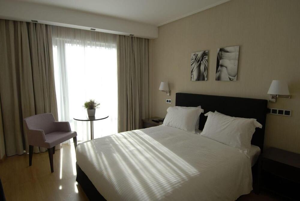 Foto de una habitación de The Athens Gate Hotel