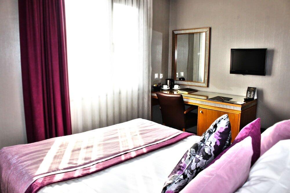 Foto de una habitación de Carlton Hotel Old City