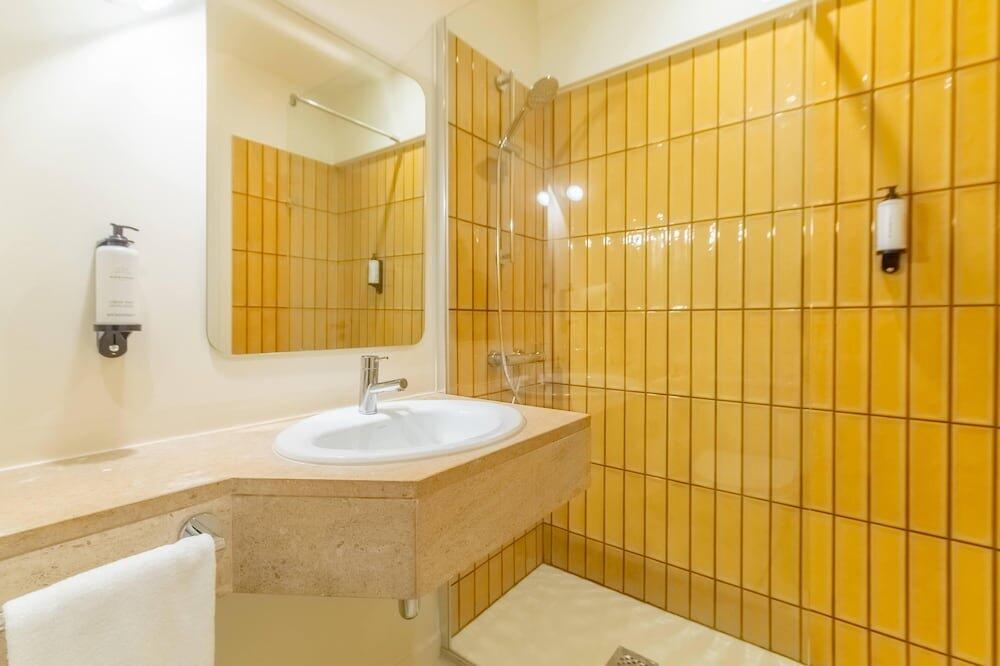 Foto del baño de Hotel WOT Lagos Montemar