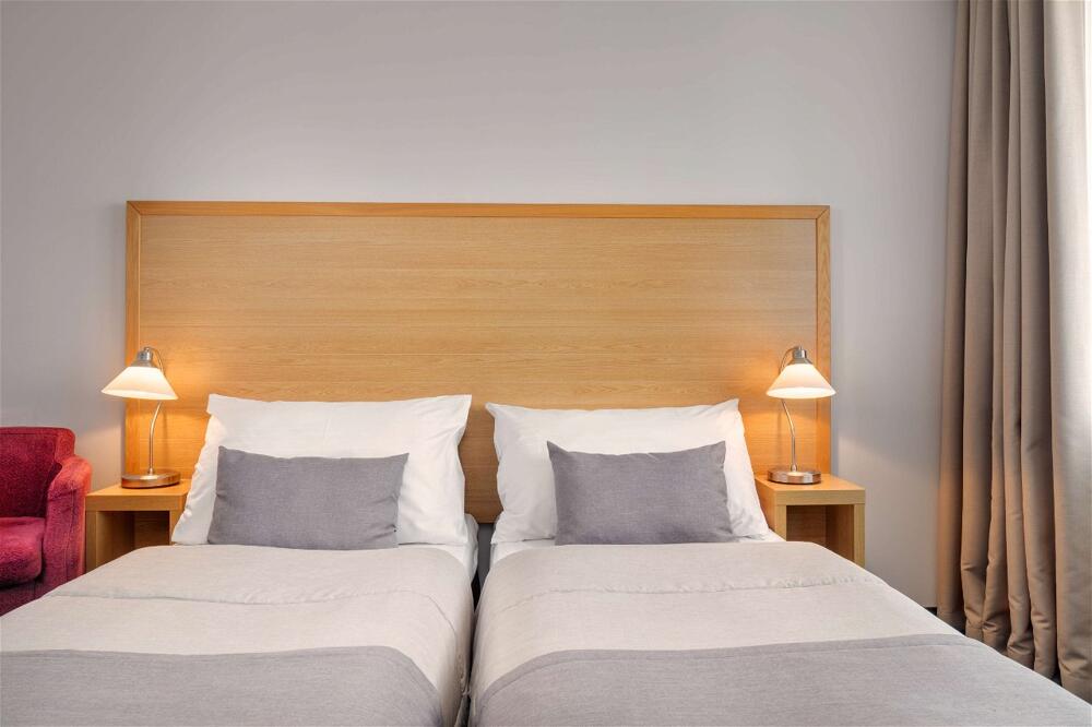 Foto de una habitación de Hotel Clement