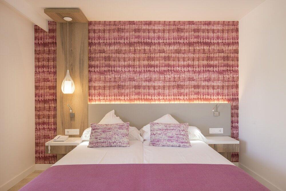 Foto de una habitación de Hotel Bella Playa &amp;amp; Spa