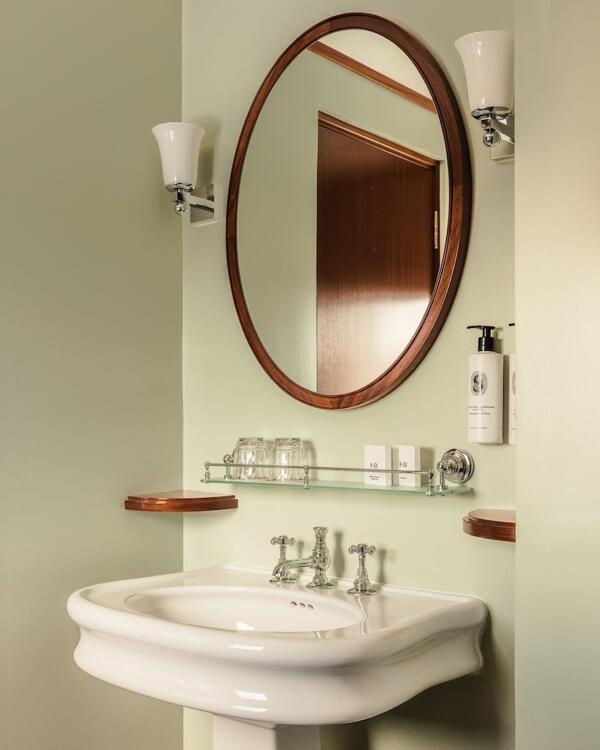 Foto del baño de Hôtel Des Grands Voyageurs