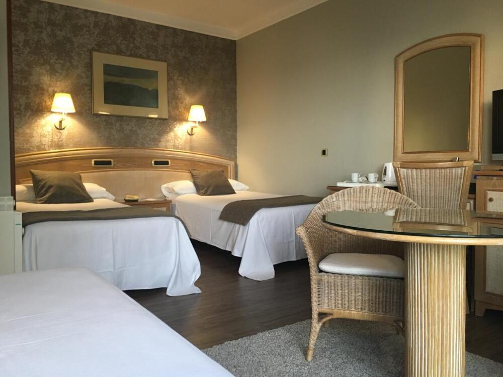 Foto de una habitación de Las Rocas Playa Hotel