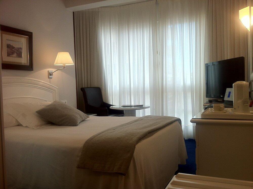 Foto de una habitación de Las Rocas Playa Hotel