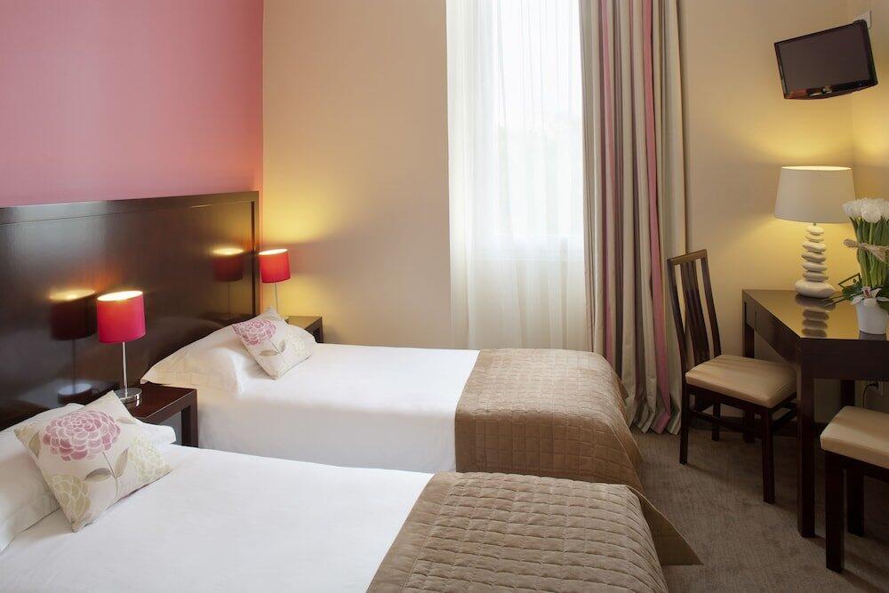 Foto de una habitación de Hôtel Relais Acropolis