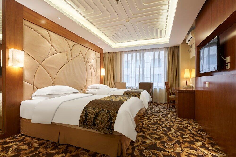 Foto de una habitación de Howard Johnson Paragon Hotel Beijing