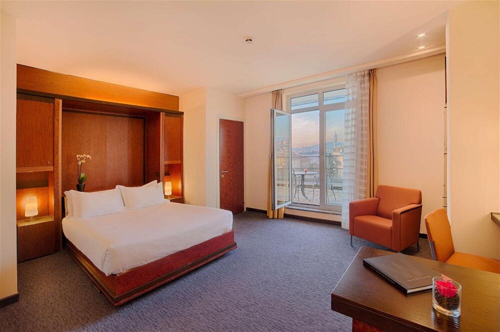 Foto de una habitación de Hotel NH Bergamo