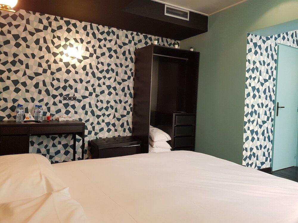 Foto de una habitación de Brit Hotel Aux Sacres Reims Centre