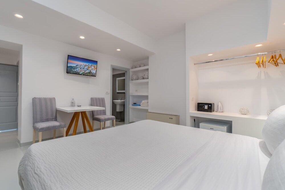 Foto de una habitación de Hotel Central Fira Suites