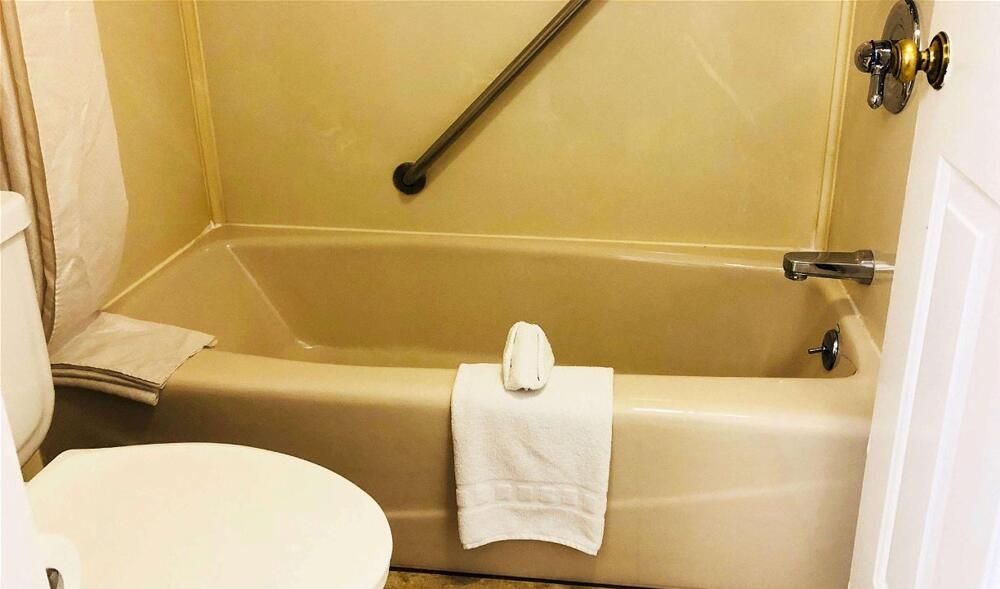 Foto de una habitación de Dynasty Suites Hotel