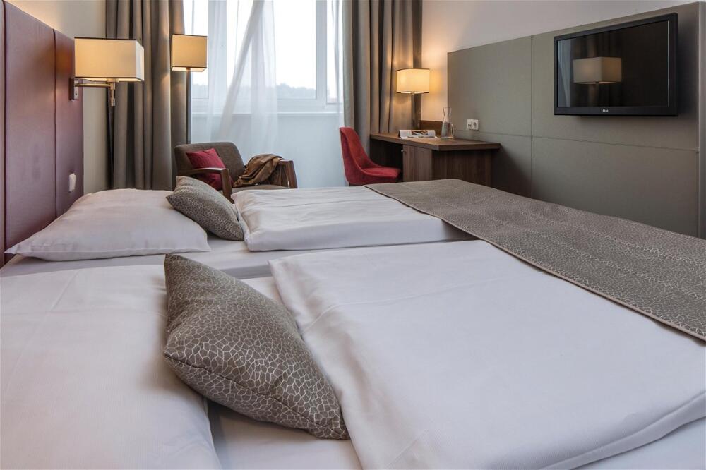 Foto de una habitación de Austria Trend Hotel Europa Salzburg