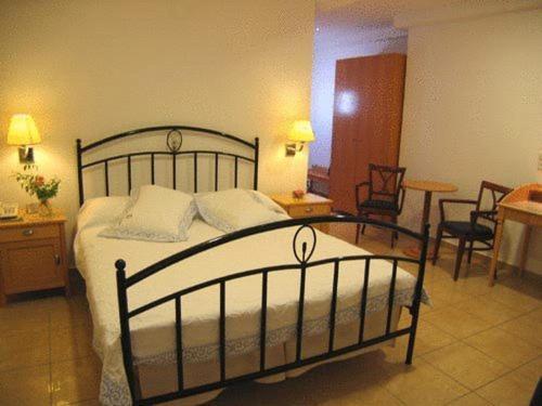 Foto de una habitación de Theoxenia Caldera Hotel