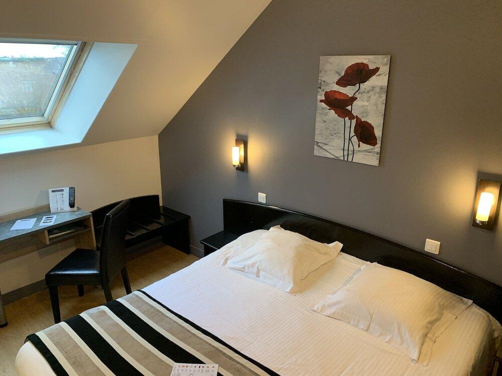 Foto de una habitación de Hotel Le Bayeux