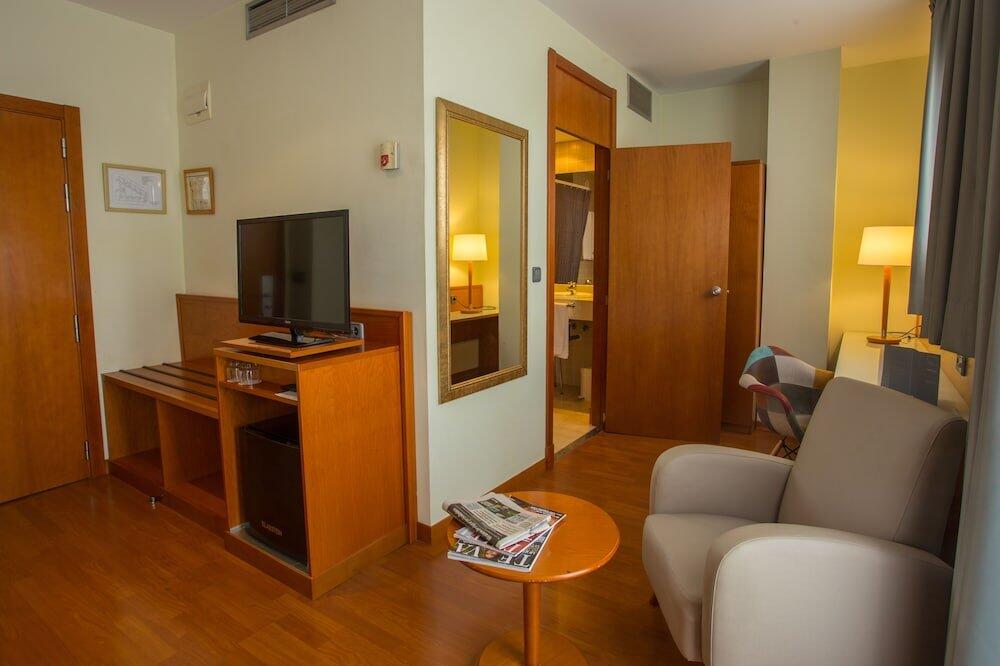 Foto de una habitación de Hotel Checkin Alaquas