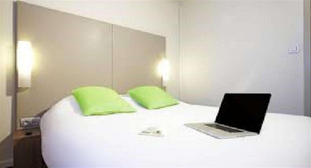 Foto di una camera da Hotel Campanile Bordeaux Sud Hopital Haut Leveque - Pessac