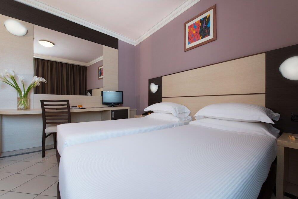 Foto de una habitación de CDH Hotel La Spezia