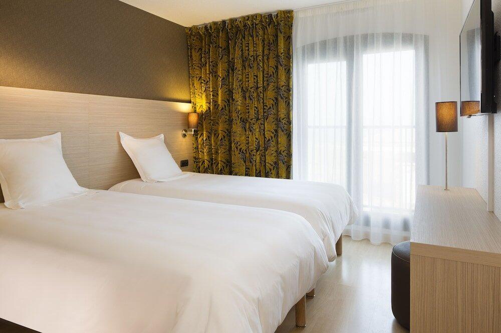 Foto de una habitación de Hotel Escale Oceania Saint Malo