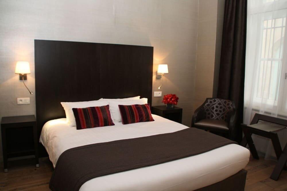 Foto de una habitación de Hotel De Guise