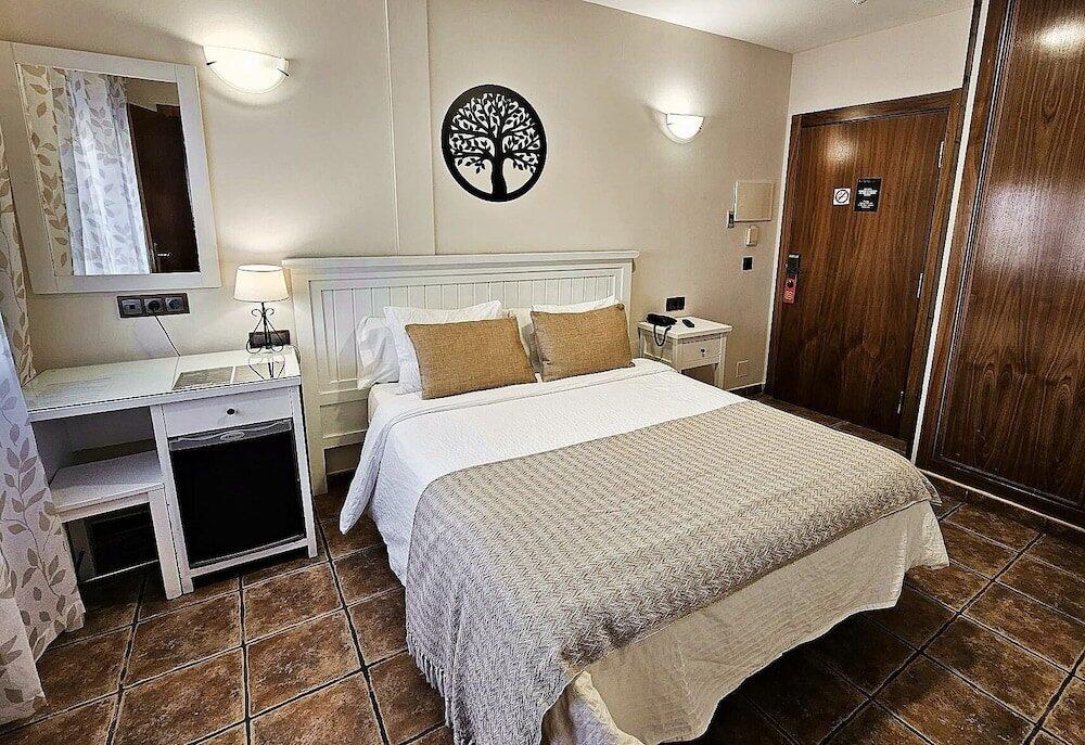 Foto de una habitación de Hotel Medina de Toledo