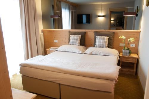 Foto de una habitación de Alexander Charme Hotel