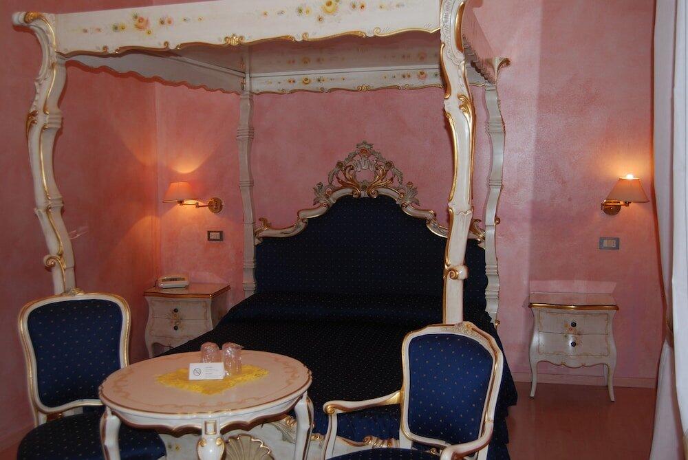Foto de una habitación de Garda Sol SPA Hotel &amp;amp; Appartamenti