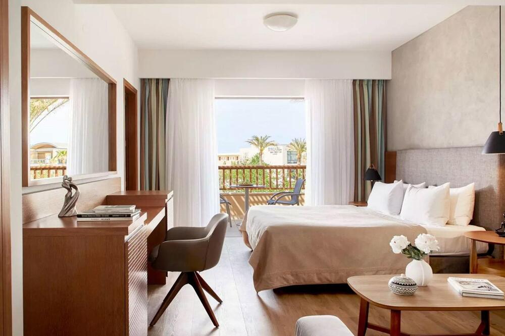 Foto de una habitación de Hotel Minoa Palace Resort